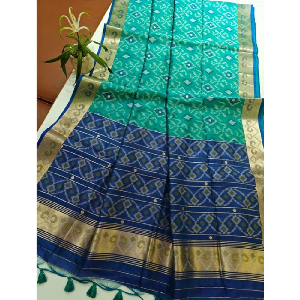 PID-65641-Generic-Women-S-Raw-Silk-Ikkat-Saree-With-Unstitched-Blouse-5-5-Mtr-Sky-Blue-2-1000x1000-1.webp Women's Raw Silk Ikkat Saree With Unstitched Blouse 5.5Mtr (Sky Blue) - Image 1