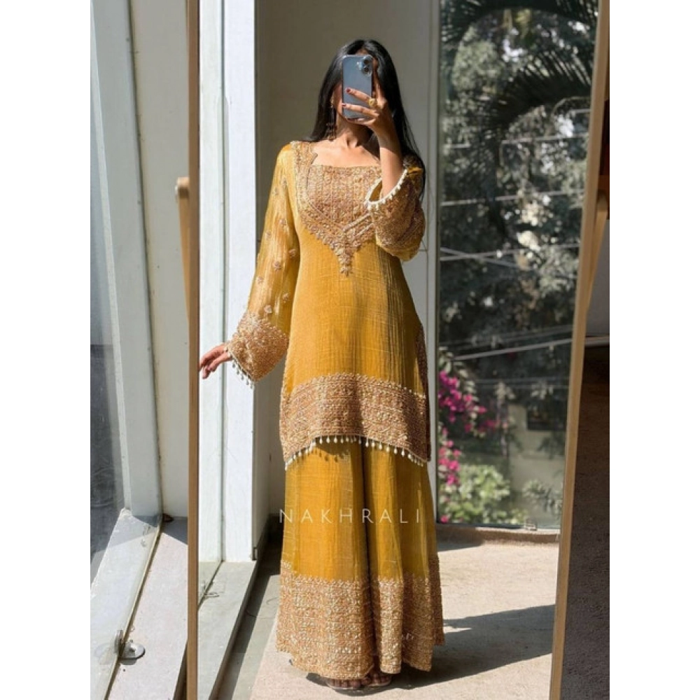 PID-66502-Women-s-Silk-Embroidered-3-4th-Sleeve-Round-Kurti-With-Sarara-and-Dupatta-Set-Yellow-1-1000x1000-1.webp Women's Silk Embroidered 3/4th Sleeve Round Kurti With Sharara Pant and Dupatta Set (Yellow) - Image 1